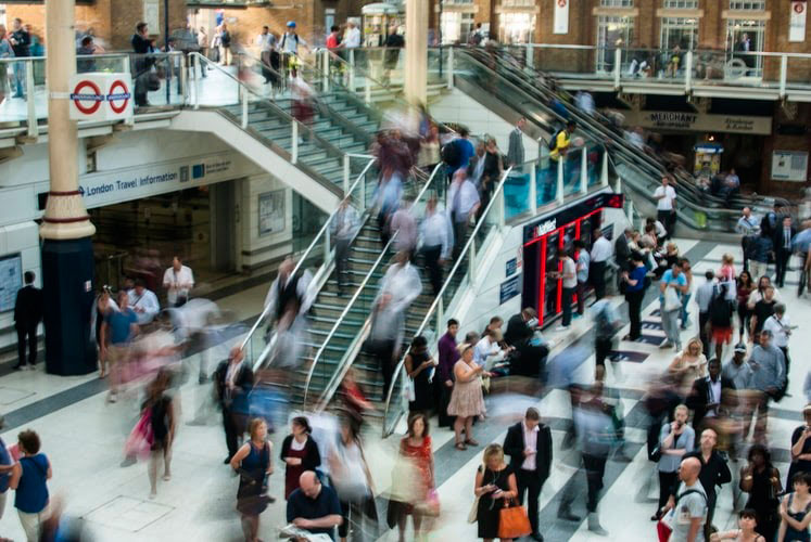 people shopping in a crowded mall