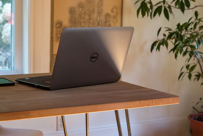 a Dell computer rests on a desk