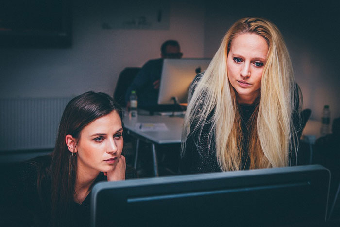 Two women at computers